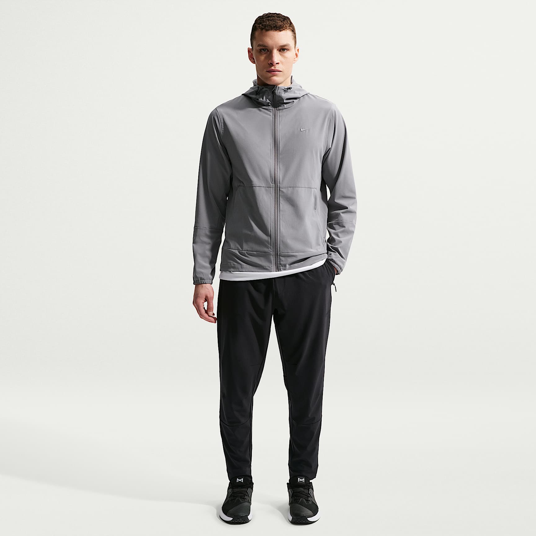 Nike Unlimited Men's Dri-FIT Zip Cuff Versatile Trousers. Nike RO